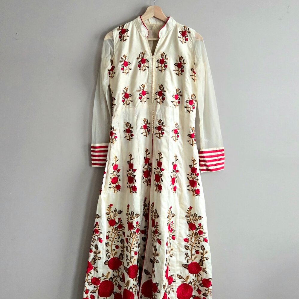 Anarkali suit with red floral embroidery. East Indian outfit.